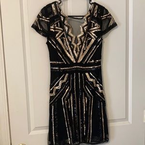 Black and gold sequin party dress